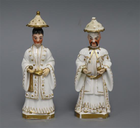 A pair of Jacob Petit porcelain scent bottles, modelled on a chinaman and woman height 17.5cm